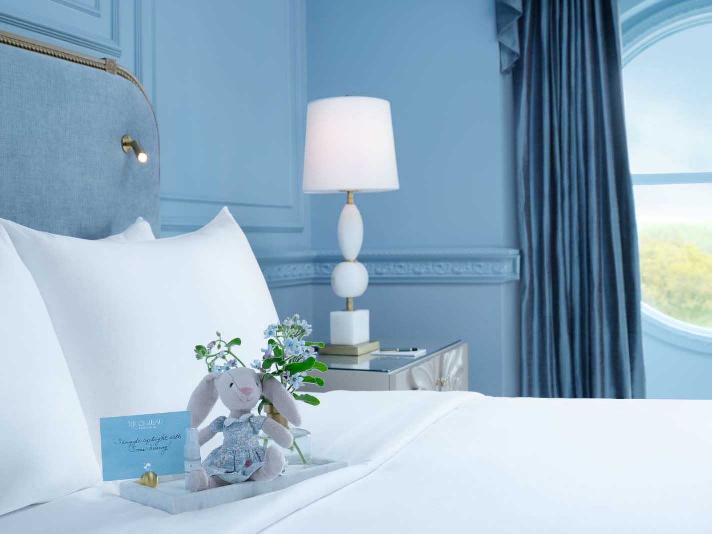 A close-up view of the exquisite details in the blue room, highlighting rich textures, patterns, and luxury décor elements.